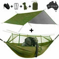 Hammock with mosquito net, rain tarp and straps